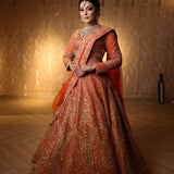 Ekani Rust Orange Rawsilk Lehenga Set
